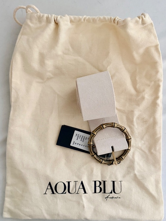 NWT, never worn ivory suede Aqua Blu belt
